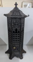 A late 19th century French cast iron and red glass parlour stove, 83cm h Location: