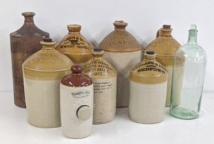 A collection of two-tone flagons to include a white Bros Botanical Brewery Forest Gate, E 1907 and