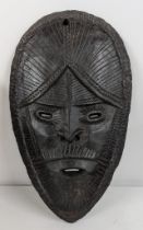 A mask possibly carved soapstone Location: