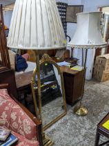 Two brass column standard lamps with fabric shades, along with a Belgium gilt framed modern wall