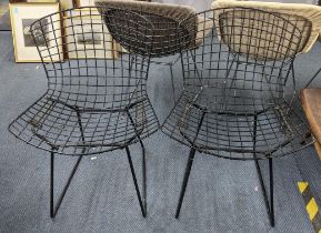 A pair of mid 20th century Harry Bertoia wire chairs in black painted frames Location: