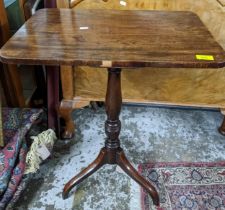 A Georgian mahogany pedestal occasional table, rectangular top on turned column and tripod base,