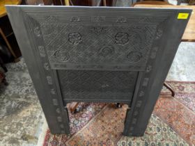 An early 20th century refurbished cast iron fire surround with a height adjustable panel Location: