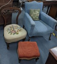 A Victorian nursing chair together with a Victorian footstool and an early 20th century low armchair