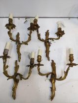 Two pairs of brass twin branch wall lights Location: LWM