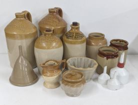 Mixed pottery items to include four two-tone flagons, three stoneware storage jars, together with