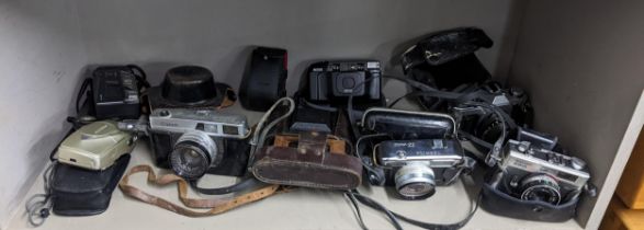 Mixed cameras to include a Canon canonet, Yahica EZ-matic and others Location: