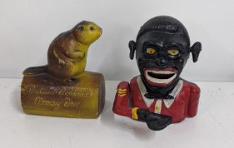 A reproduction money box, together with a Butlin Beavers money box Location: