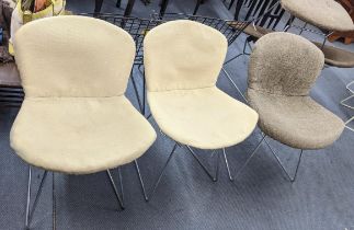 A set of three mid 20th century Harry Bertoia wire chairs in chrome frames Location: