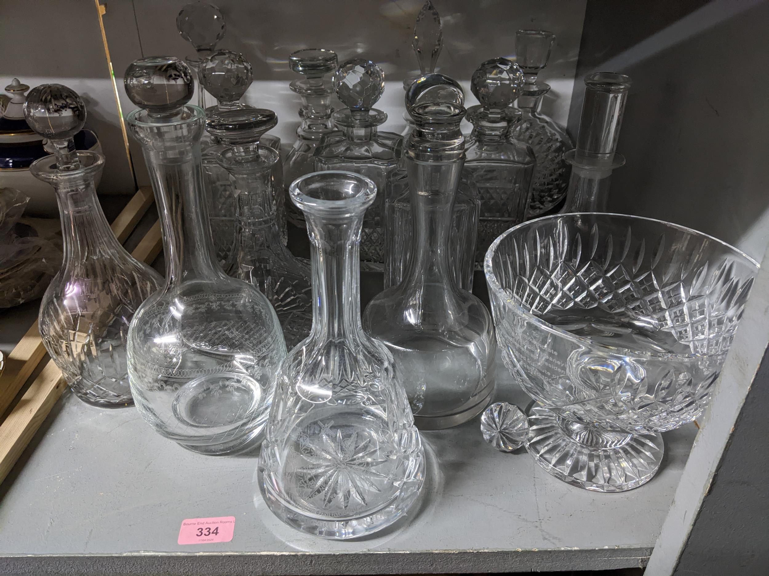 A selection of cut glass decanters to include one by Atlantis and a Stuart crystal presentation