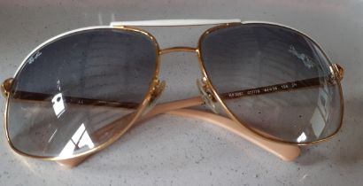 Ray Ban- A pair of vintage pilot gold tone aviators Style RB3387 having beige temple tips, grey