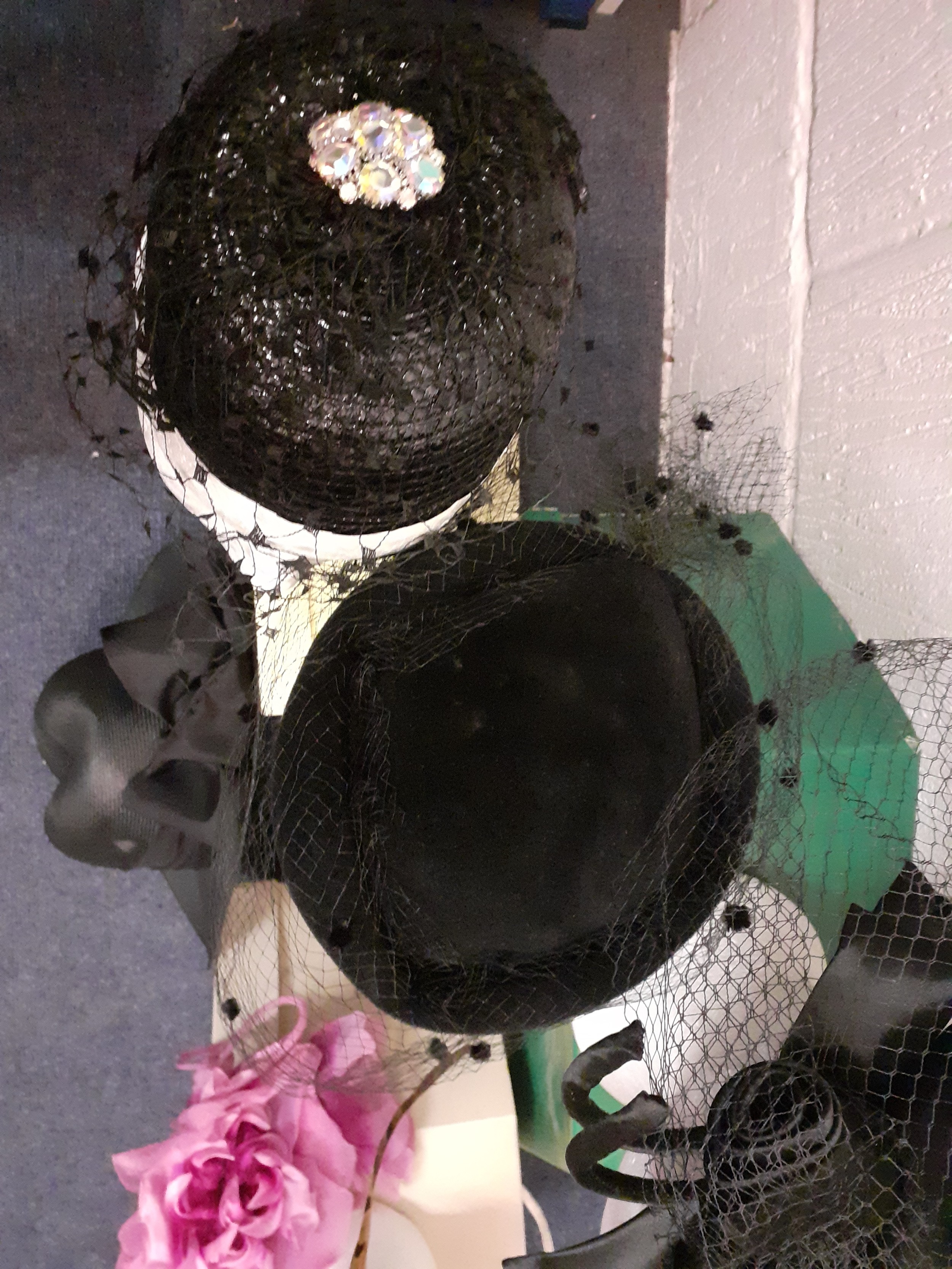 A quantity of 20th Century hats comprising a Philip Somerville black silk hat with net and bow - Image 4 of 5