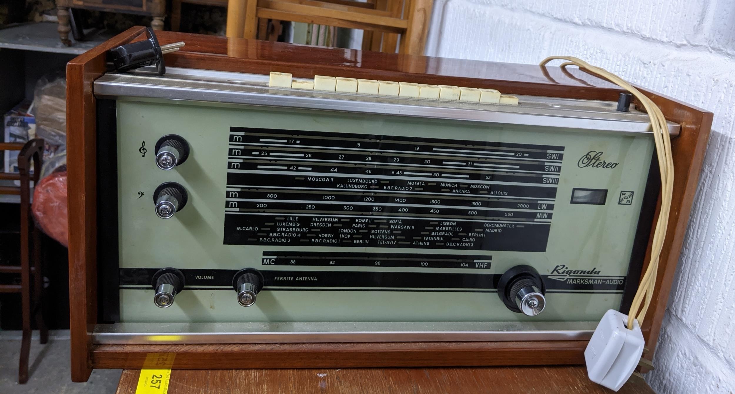 A mid-century teak cased stereo record deck, and a Rigonda Marksman stereo audio radio Location: - Image 3 of 3