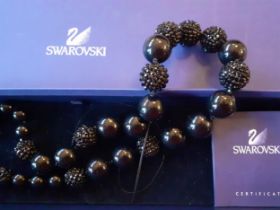 Swarovski-A jet black crystal bead necklace, 70cm long with branded box. Location:R1.3