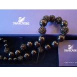 Swarovski-A jet black crystal bead necklace, 70cm long with branded box. Location:R1.3