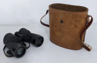 A pair of M15 binoculars in a M44 carrying case Location: Stage