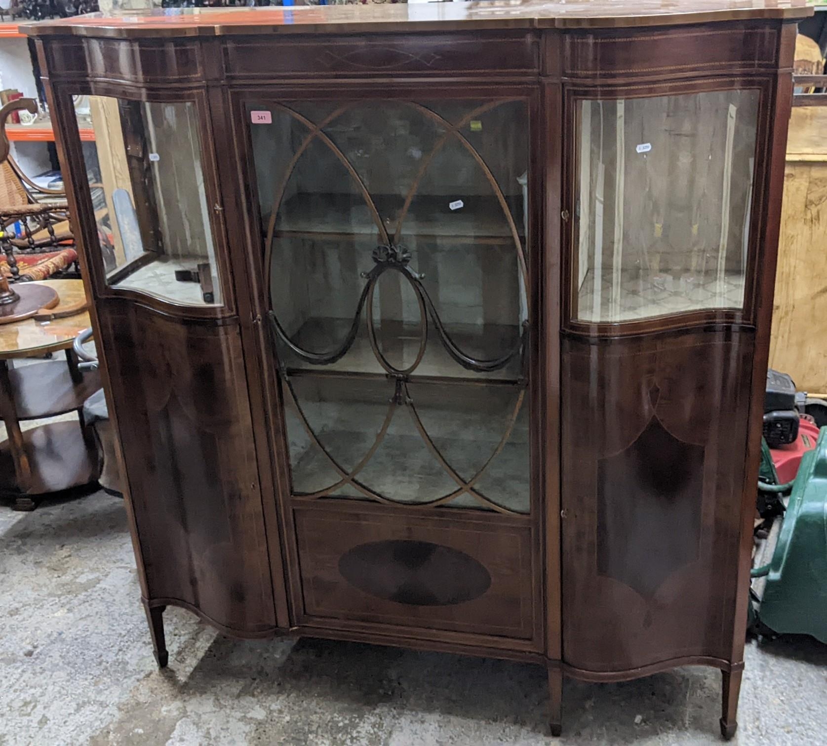 An Edwardian inlaid mahogany display cabinet, glazed central display door with fabric lined interior