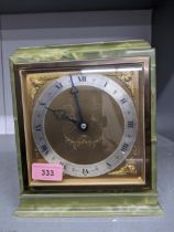 An Elliot onyx cased mantle clock, retailed by Jamieson and Carry with presentation plaque to top of