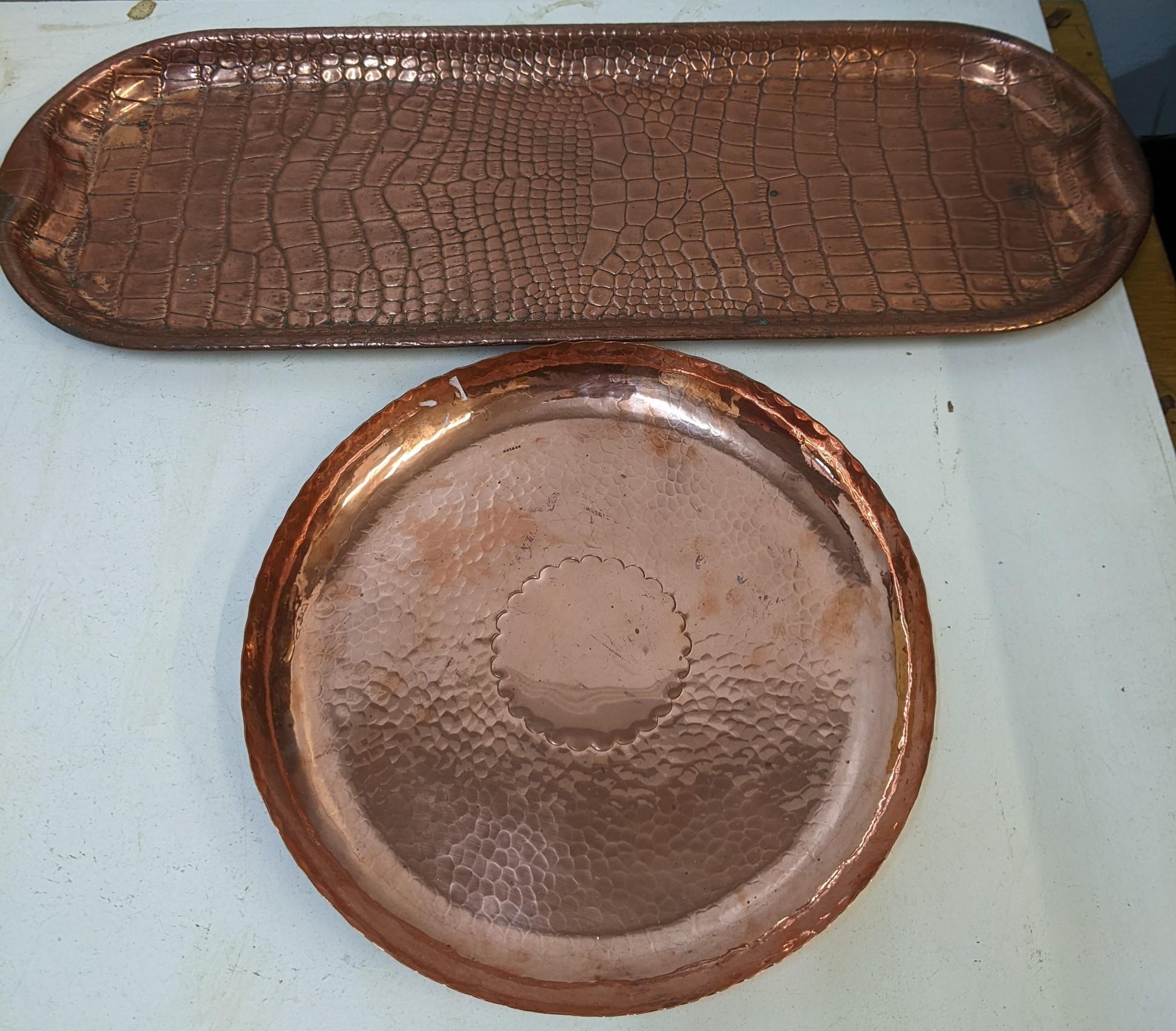 A Newlyn copper tray with spot hammered decoration and a Joseph Sankey & Son copper crocodile skin