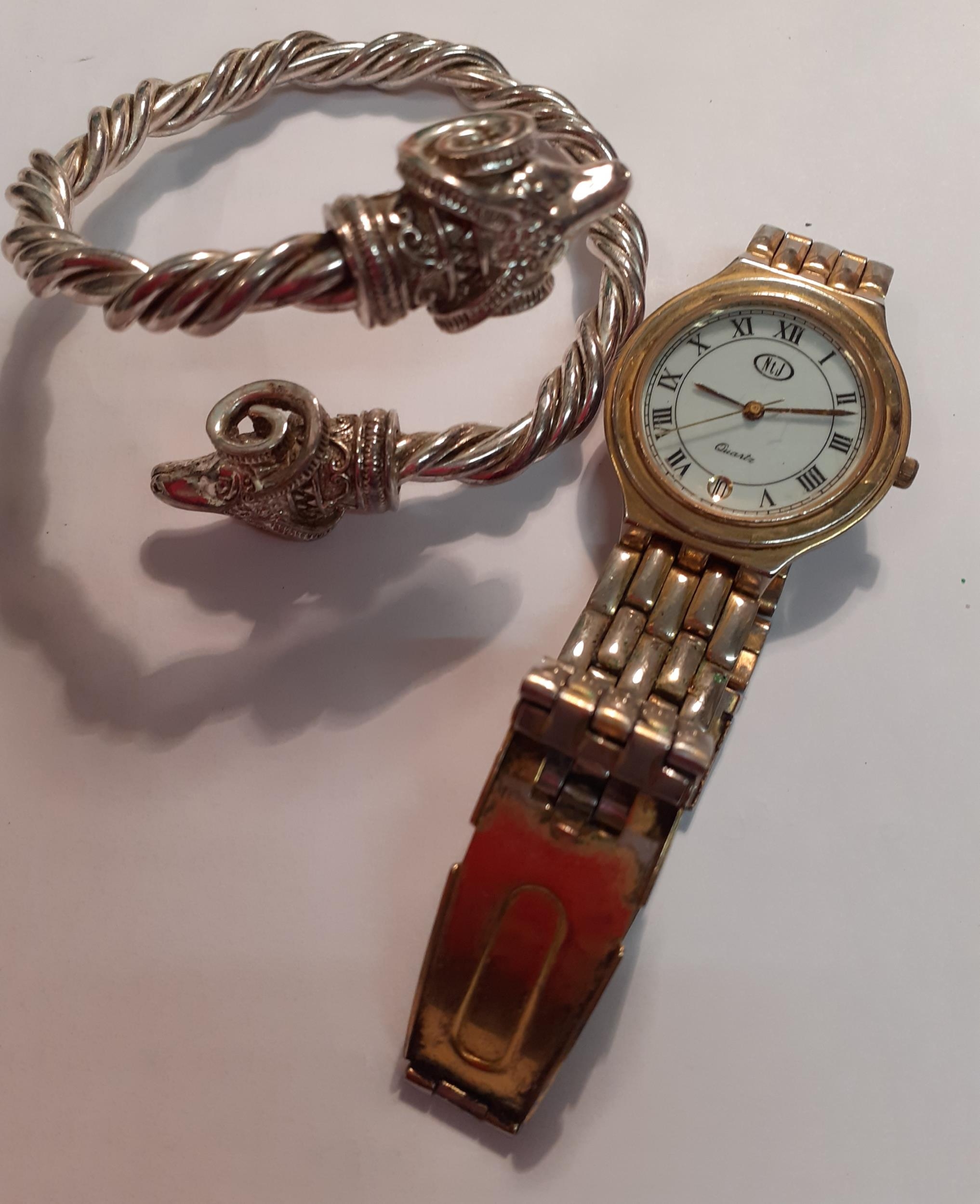 Modern costume jewellery to include a silver tone ram's head bangle together with a wristwatch. - Image 2 of 2