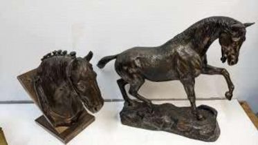 A bronzed finished composition model of a horses head, signed Robbie and another indistinctly signed