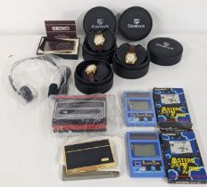 An unused Murphy Stereo and head phones together with two boxed Casio Astero Zone games, three