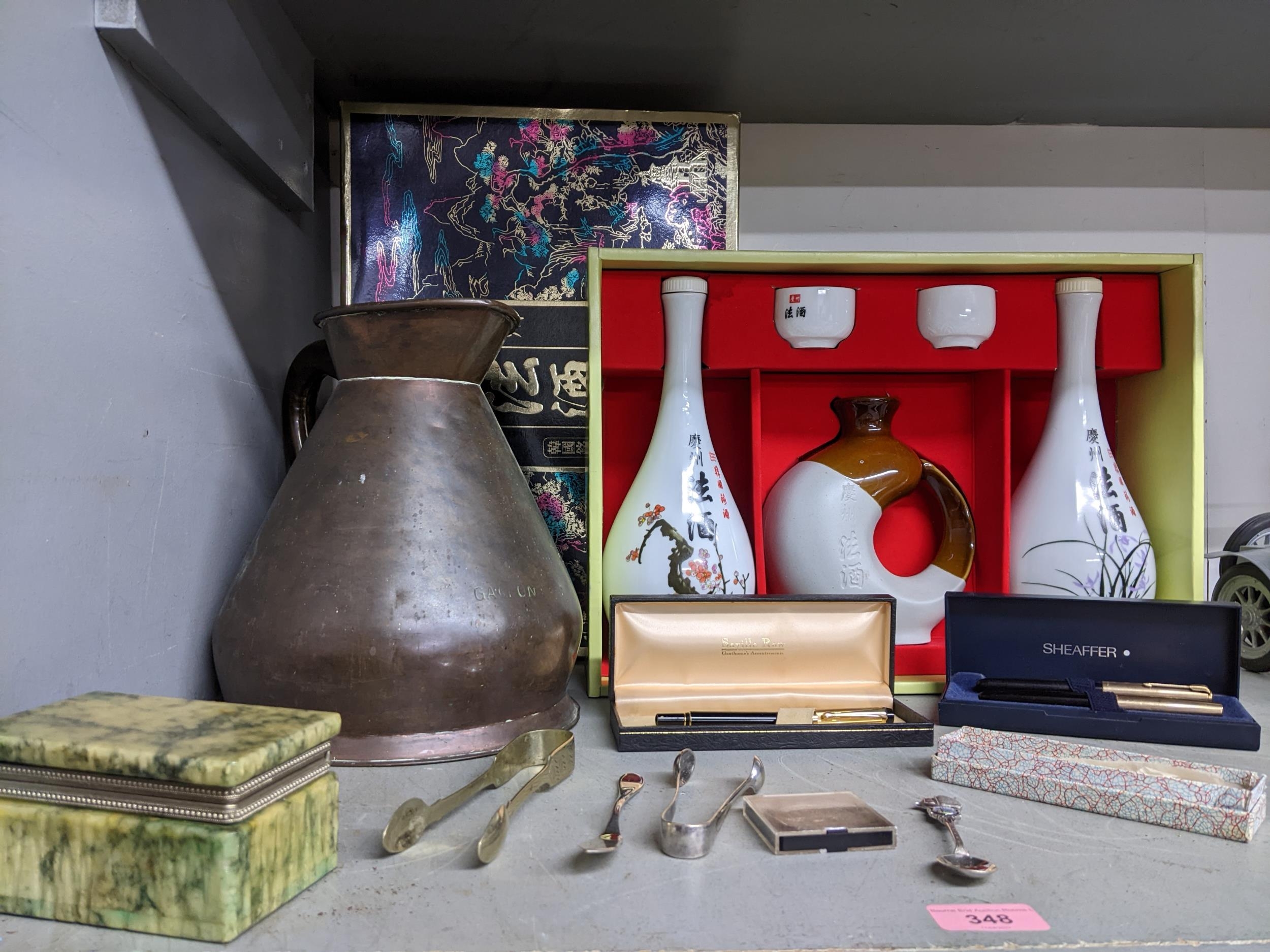 A mixed lot to include a Victorian copper gallon jug, boxed Japanese ceramic snake set two Parker 51