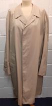 Aquascutum-A late 20th Century gents Aqua 5 beige rainmac having a checked lining, 50" chest.