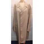 Aquascutum-A late 20th Century gents Aqua 5 beige rainmac having a checked lining, 50" chest.