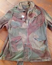 A WW2 Denison smock, issued to Special Operations Executive Agents (SOE), the Parachute Regiment,