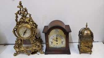 Three clocks, a 20th century lantern clock, an Indian brass cased mantel clock and a mahogany