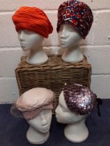 A quantity of 12 vintage hats to include 1940's turbans and formal hats by Jacoll, all housed in a