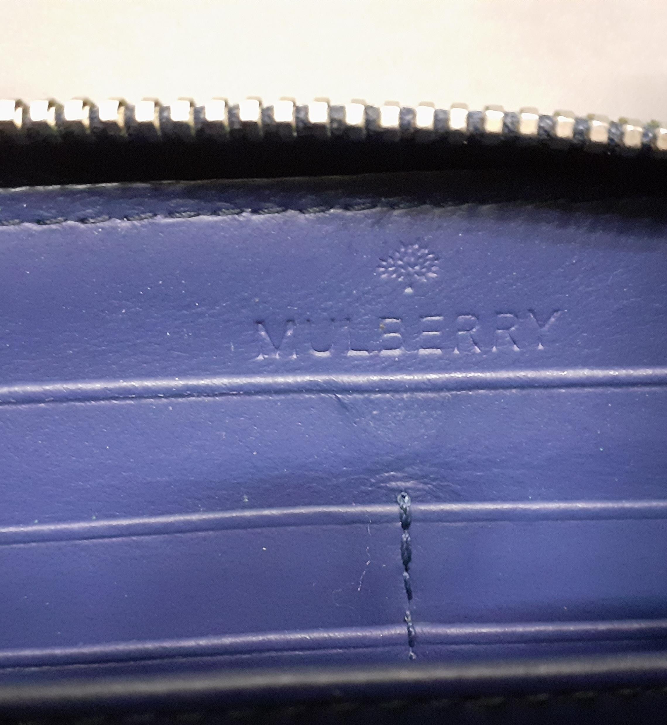 Mulberry- A mid blue leather purse having gold tone hardware and punched hole outline of the - Image 6 of 7