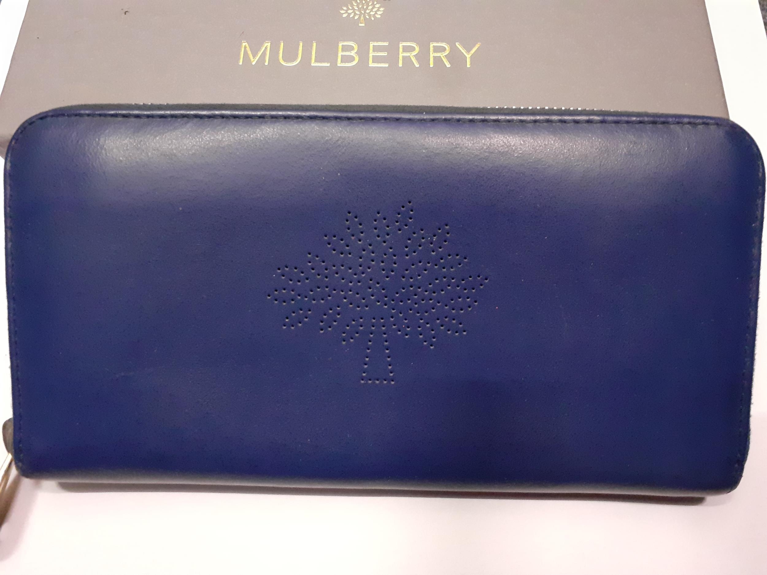 Mulberry- A mid blue leather purse having gold tone hardware and punched hole outline of the - Image 3 of 7