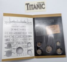 Coins of the Titanic - a booklet which houses five USA coins each dated 1912, comprising of Half