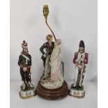 A pair of early porcelain French model soldiers and a Capodimonte lamp Location: