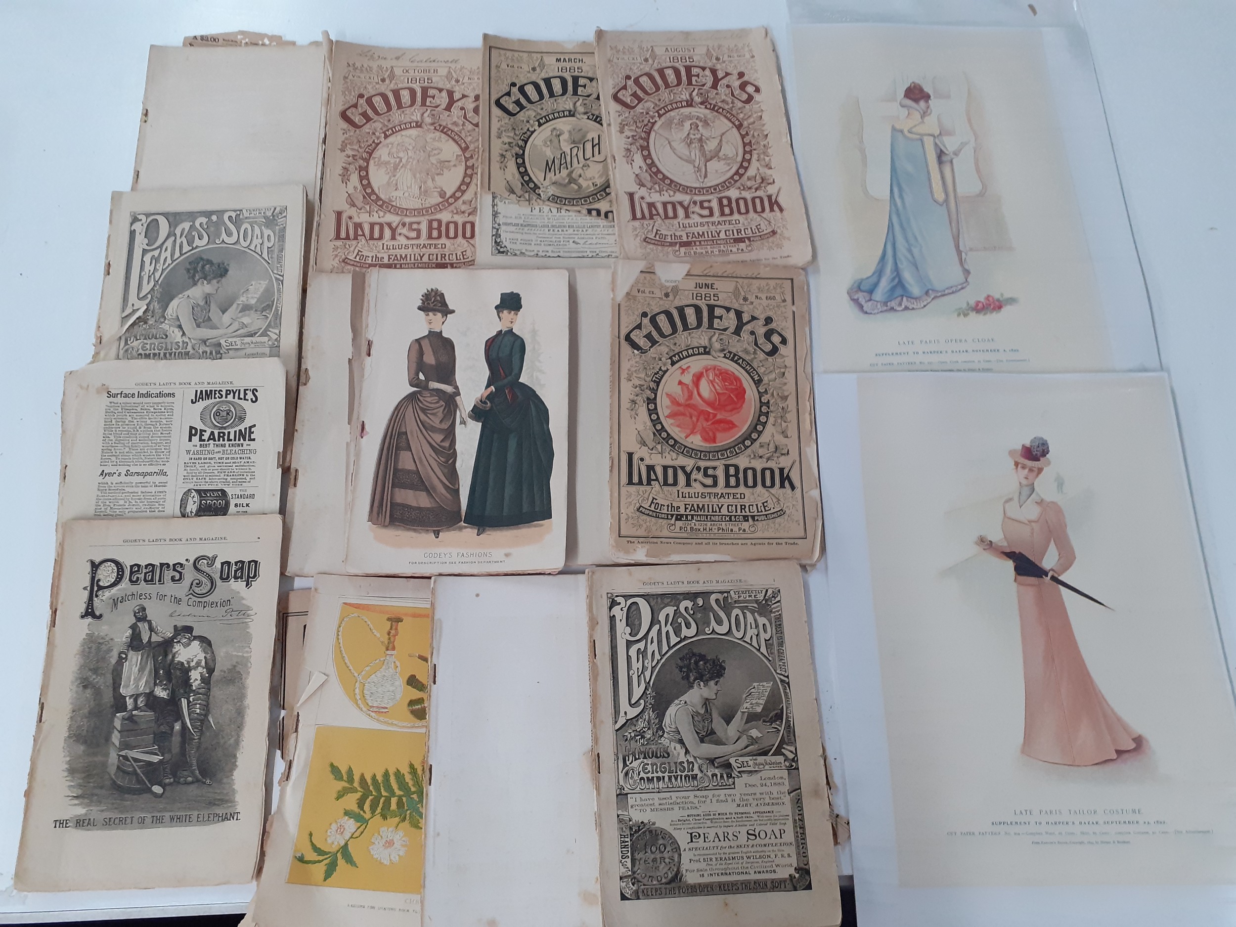 A group of 1880's Godey's lady's magazines A/F together with 2 late 19th Century cut paper