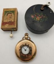 A gold plated half hunter pocket watch, a Victorian black painted metal musical box, a musical