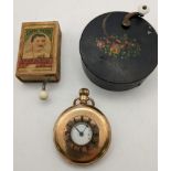 A gold plated half hunter pocket watch, a Victorian black painted metal musical box, a musical