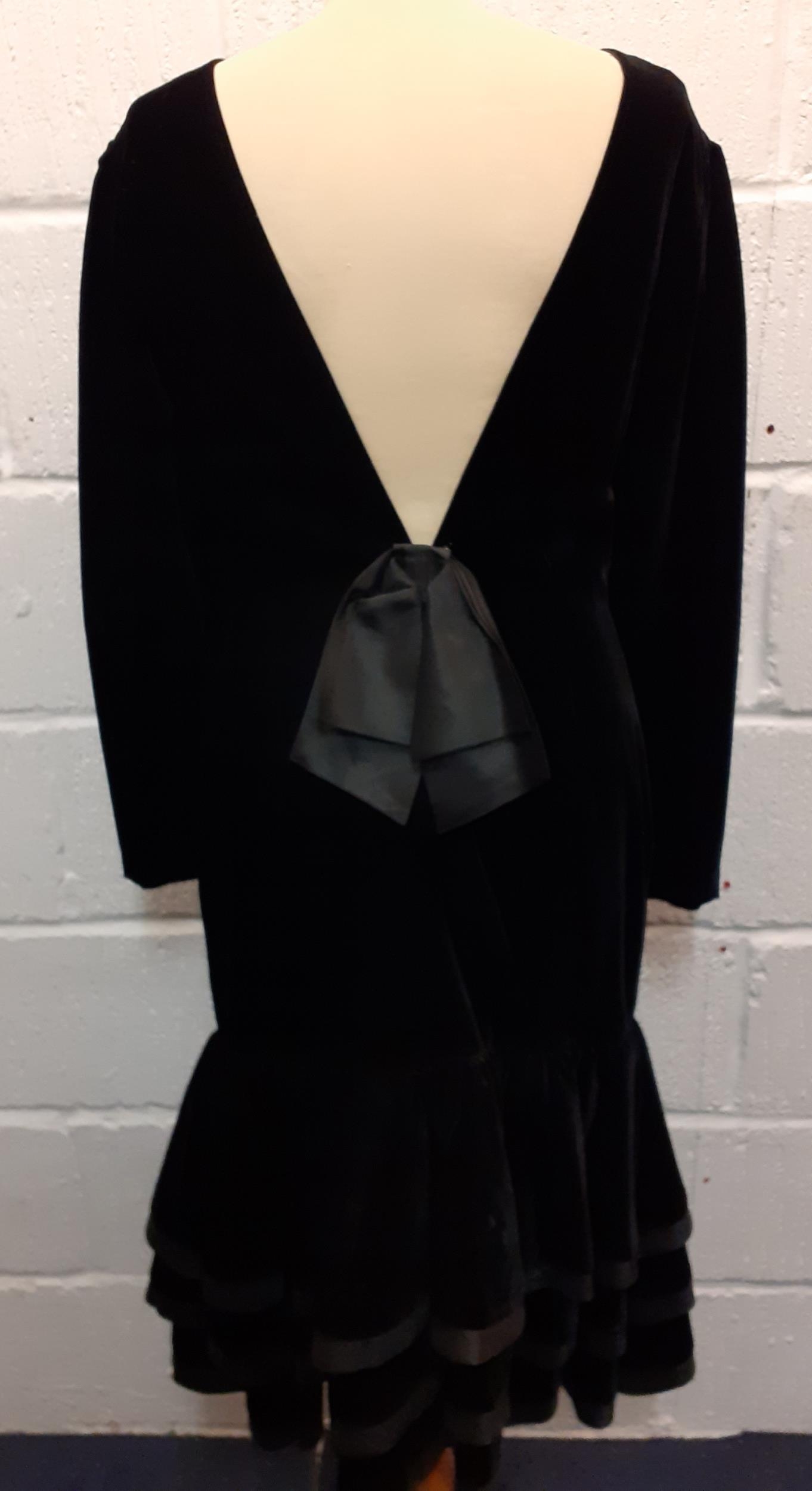 Louis Feraud-A 1980's black cocktail dress having a plunged back with bow detail and a 3 tiered - Image 4 of 6