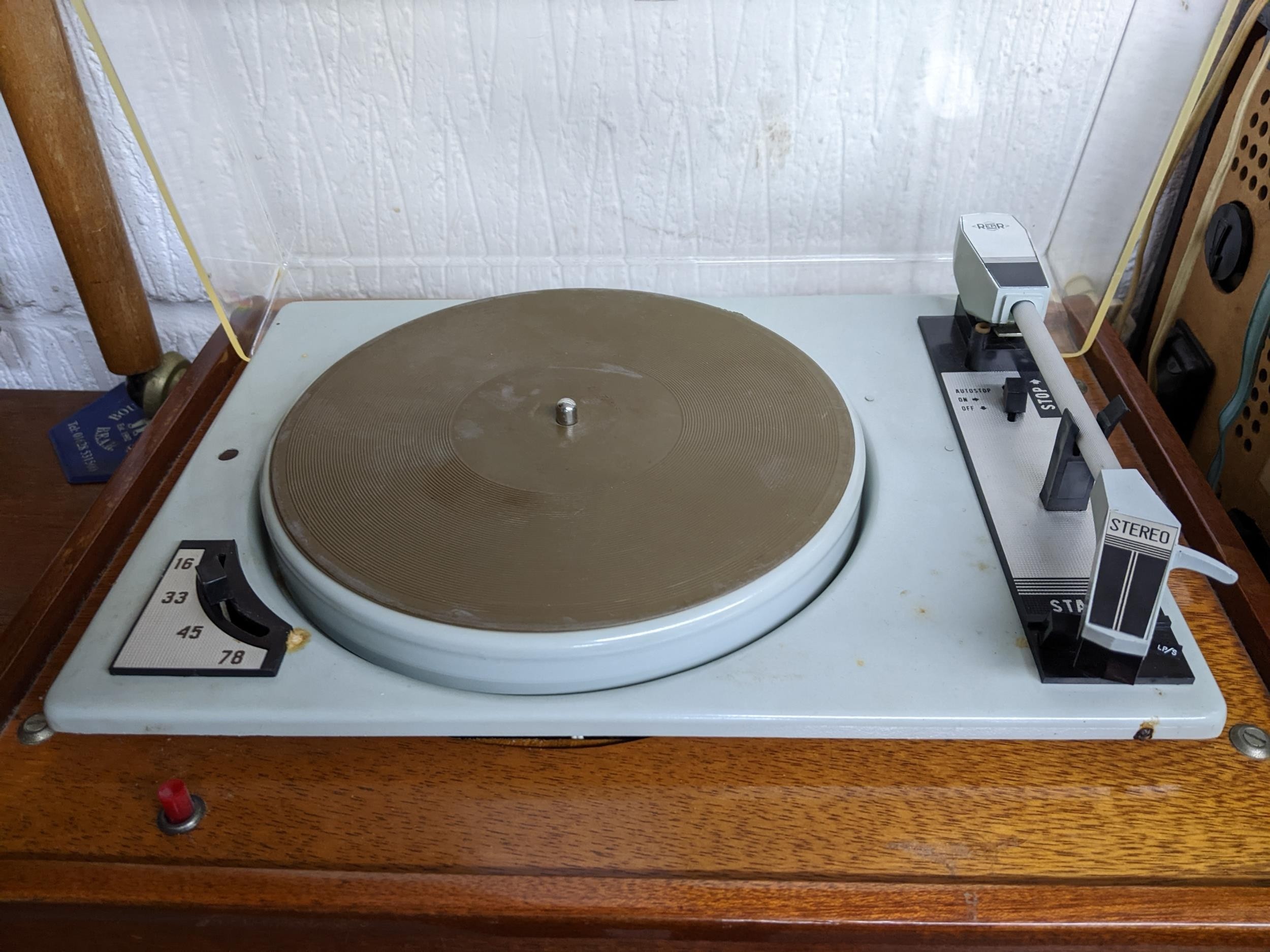 A mid-century teak cased stereo record deck, and a Rigonda Marksman stereo audio radio Location: - Image 2 of 3