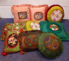 Nine vintage bespoke cushions to include embroidered, silk and beaded examples. Location: