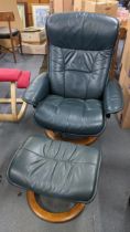 A vintage green leather Ekornes swivel and reclining armchair with matching footstool Location: