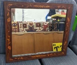 A 19th century Dutch marquetry inlaid wall hanging mirror Location: