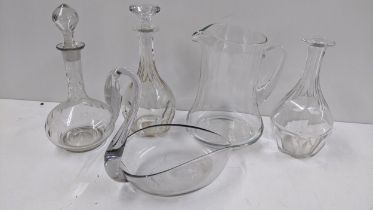 Mixed glassware to include two Baccarat decanters, swan form vase possibly by Whitefriars, and