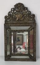 A late Victorian /early 20th century decorative brass wall hanging mirror 61cmh x 34.5cm W Location: