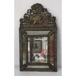 A late Victorian /early 20th century decorative brass wall hanging mirror 61cmh x 34.5cm W Location: