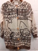 Ladies knitted items to include a Moschino 'Cheap & Chic Collection' cream and brown knitted