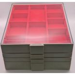 A Lindner Coin/Collectors stackable trays, housing various sized red felt lined inserts, Location: