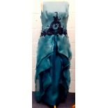 A 1980's Wim Hemmink teal silk sleeveless evening gown, UK size 14, having navy lace applique to the